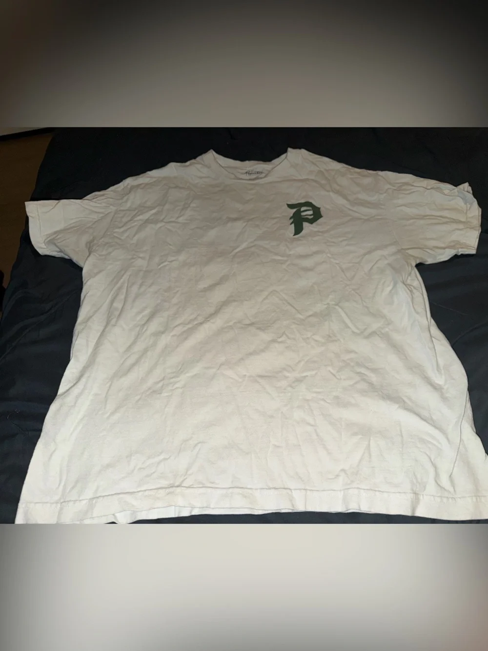 Primitive White Short Sleeve Tee with Green Chest Logo
